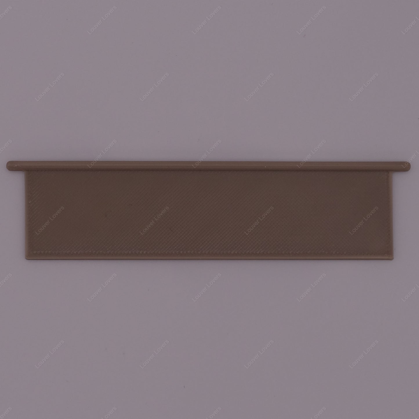 This is a photo of a 4 1/16" wide 1 1/16" tall dark beige colored vent slat with a white background.