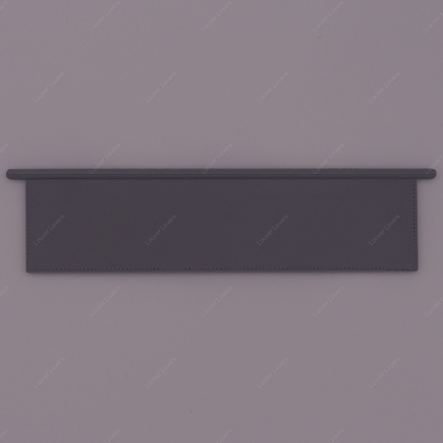 This is a photo of a 4 1/16" wide 1 1/16" tall gray colored vent slat with a white background.