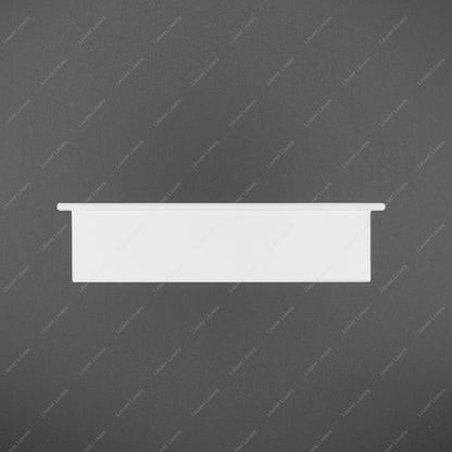 This is a photo of a 4 1/16" wide 1 1/16" tall natural colored vent slat with a black background.