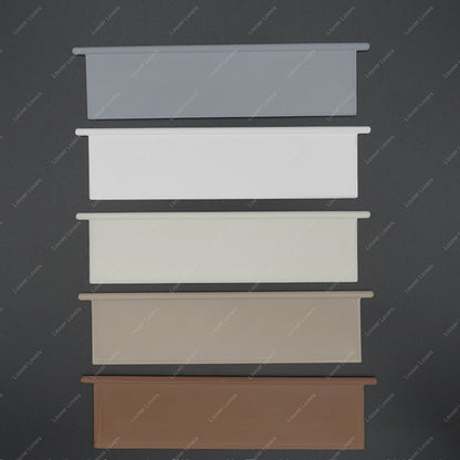 This is a photo of the 4 1/16" wide 1 1/16" tall vent slat in all available colors with a black background.